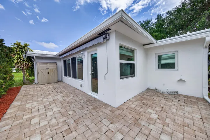 Remote control, retractable awning (2023) and backyard pavers porch (2023)