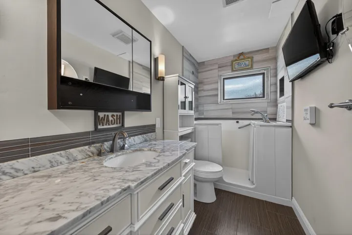 Kohler Walk-In Tub with wall mounted TV (Bathroom #2)