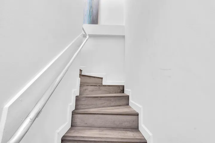 Stairs to upstairs living area - Feels like a townhouse