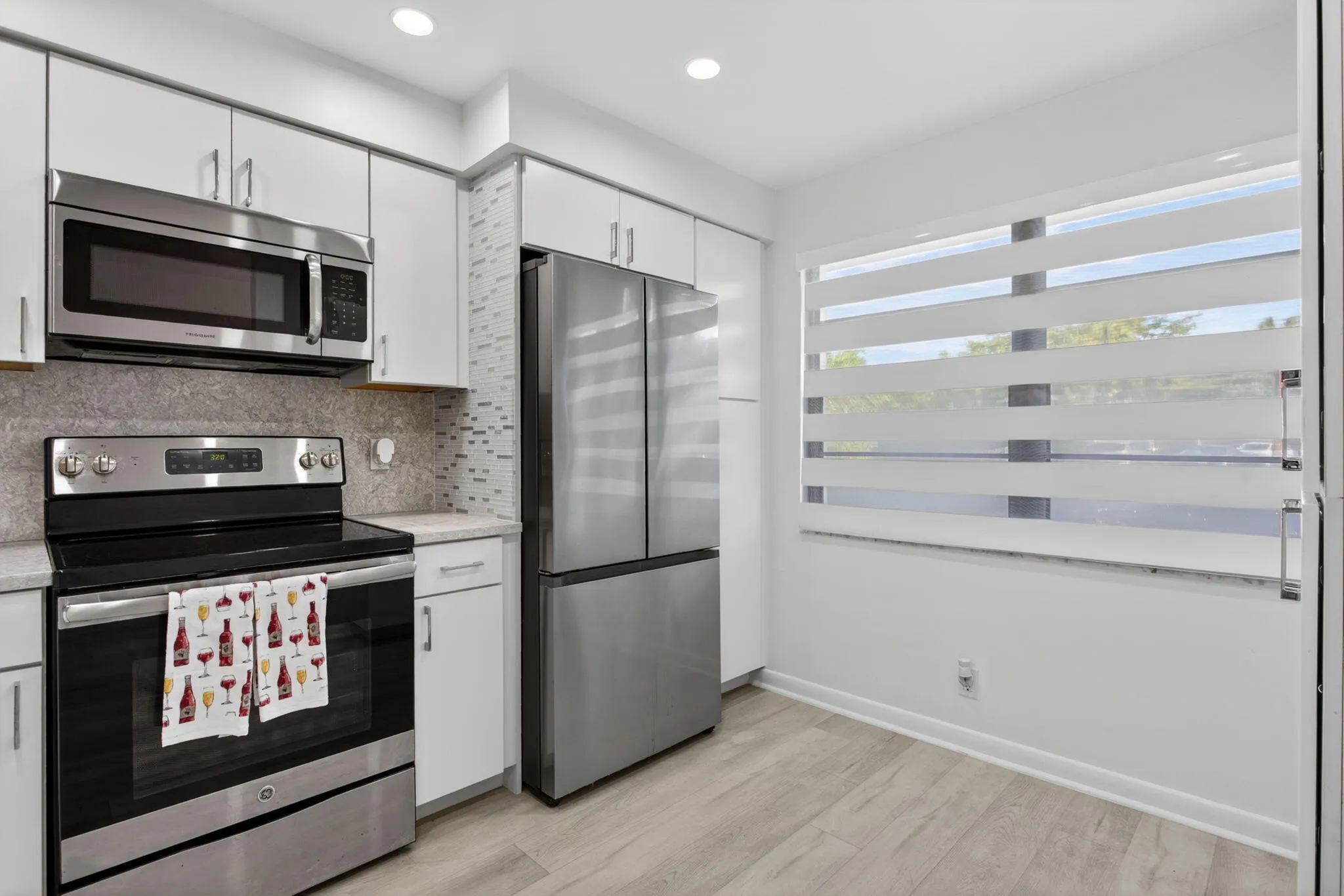 SS APPLIANCES/COUNTER DEPTH REF. NEW CEILING