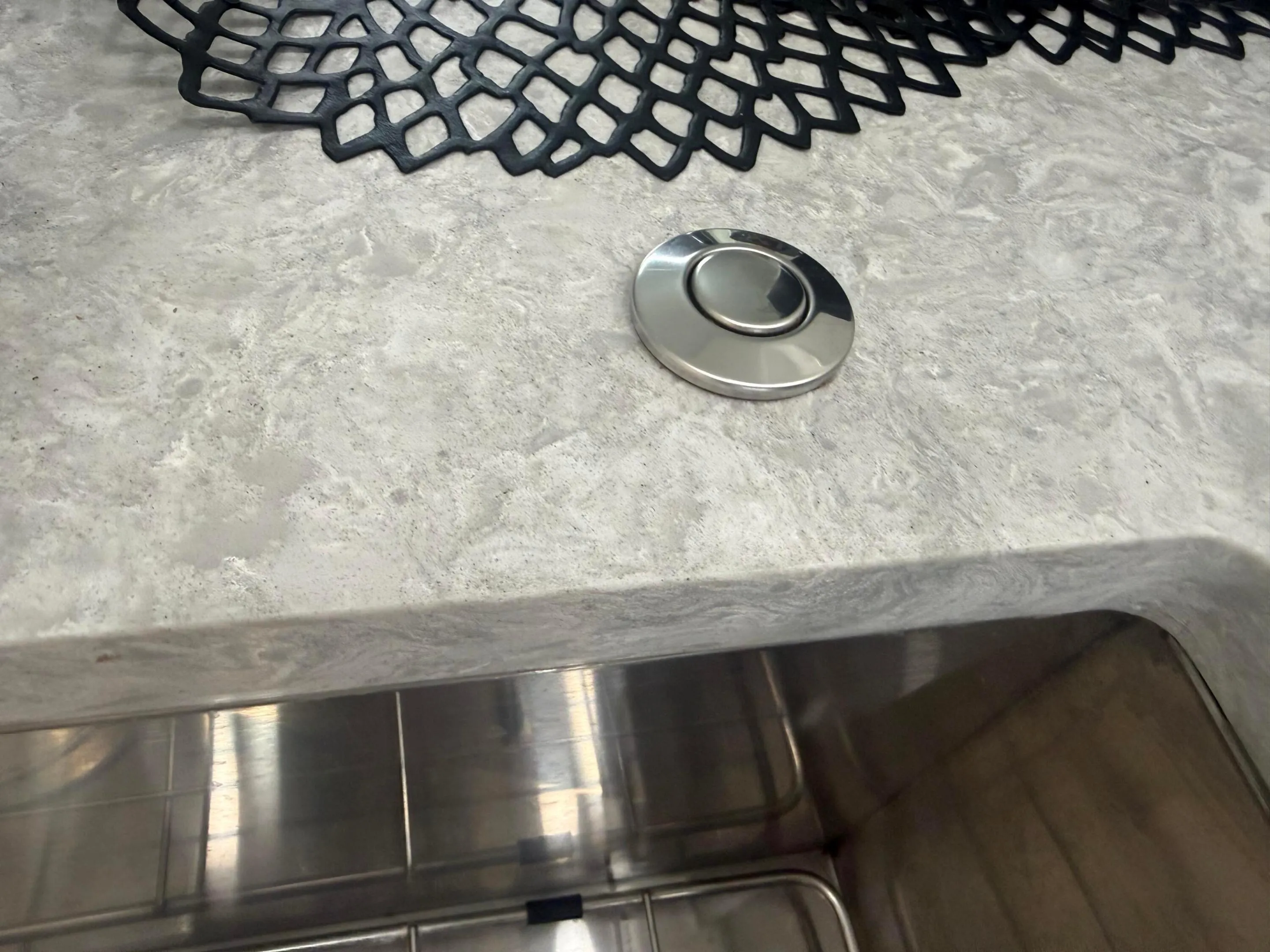 GARBAGE DISPOSAL BUTTON