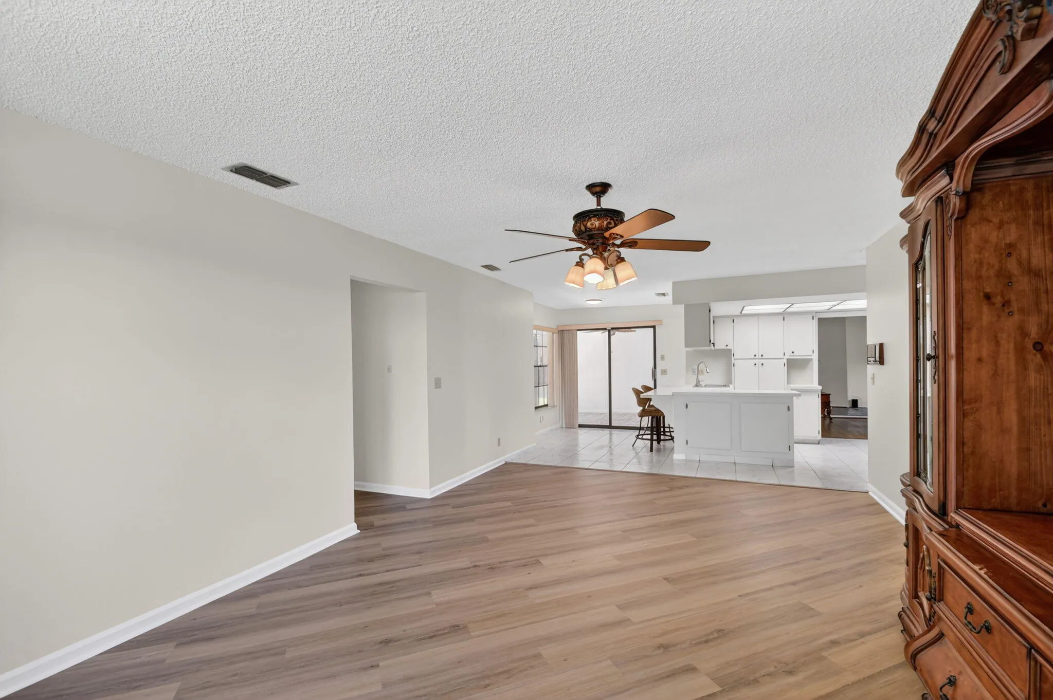 A view from the family room looking into the kitchen