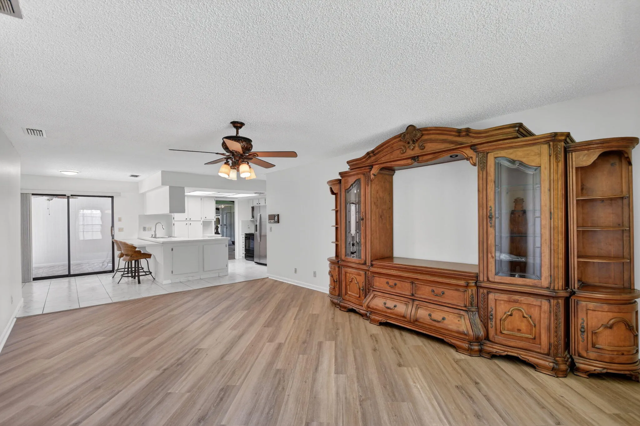 A view from the family room looking into the kitchen