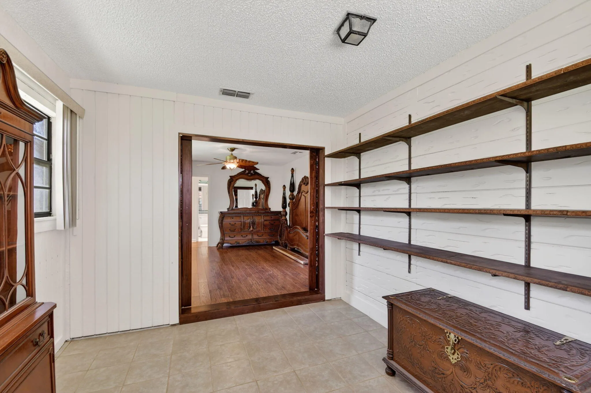 The bonus room is connected to the primary bedroom. It is great for a sitting area, a TV room, exercising, or a nursery.