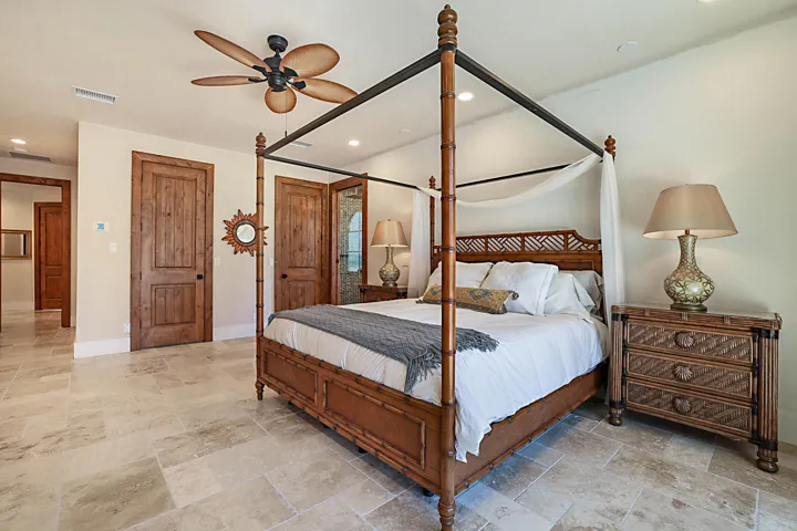 Custom Closet Systems throughout with hampers, jewelry drawers; secret gun safe room with murphy door access in one of the two primary walk-in closets