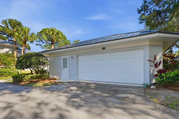 1.5 car garage with finished floor, can accommodate one car and a golf cart.