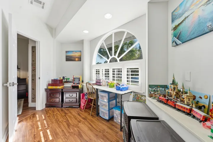 Area may be used as a sitting room, office, or dressing area. Large walk-in closet on left.