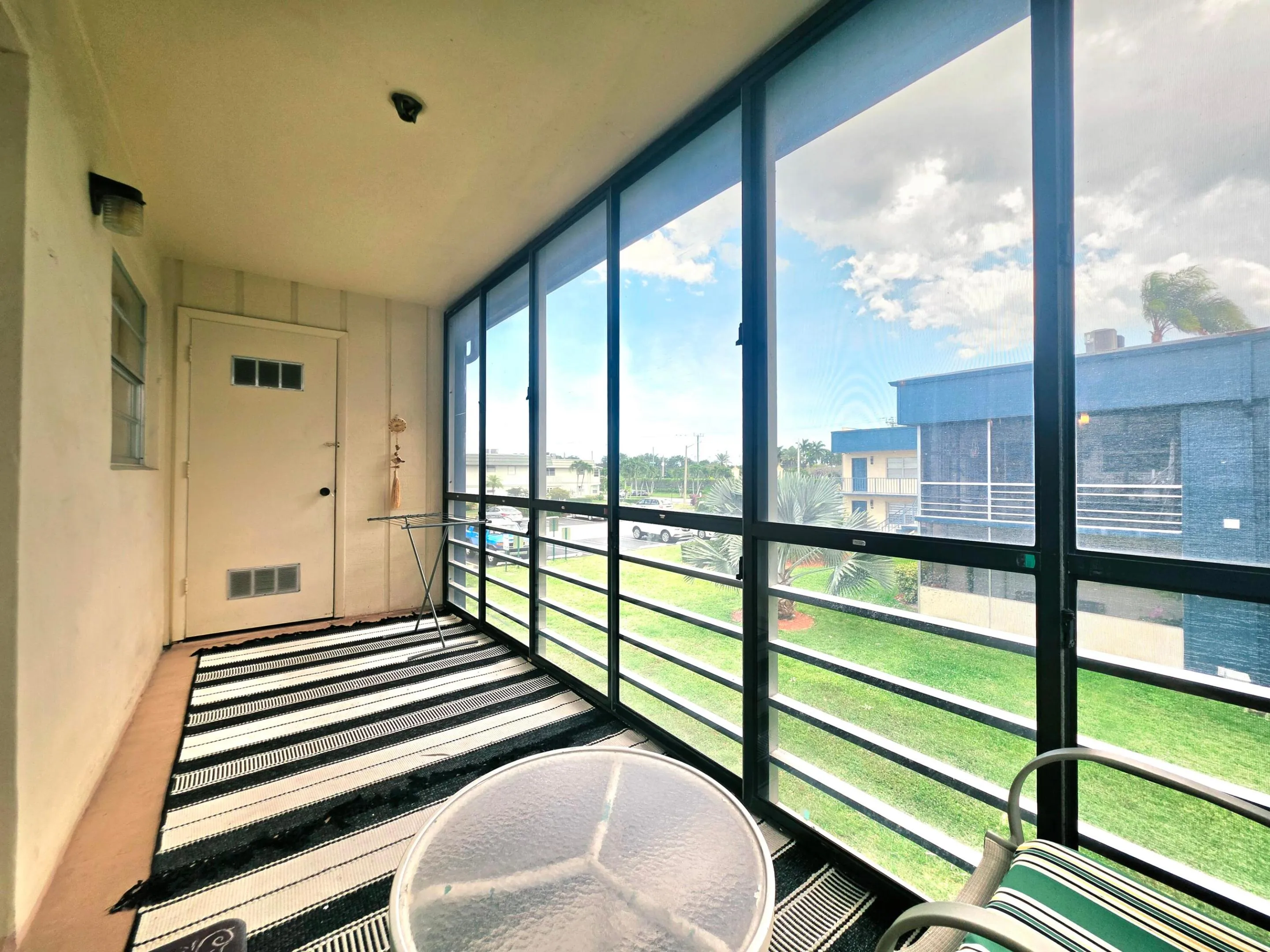ANOTHER VIEW OF THE BALCONY SHOWING YOUR LAUNDRY/STORAGE ROOM