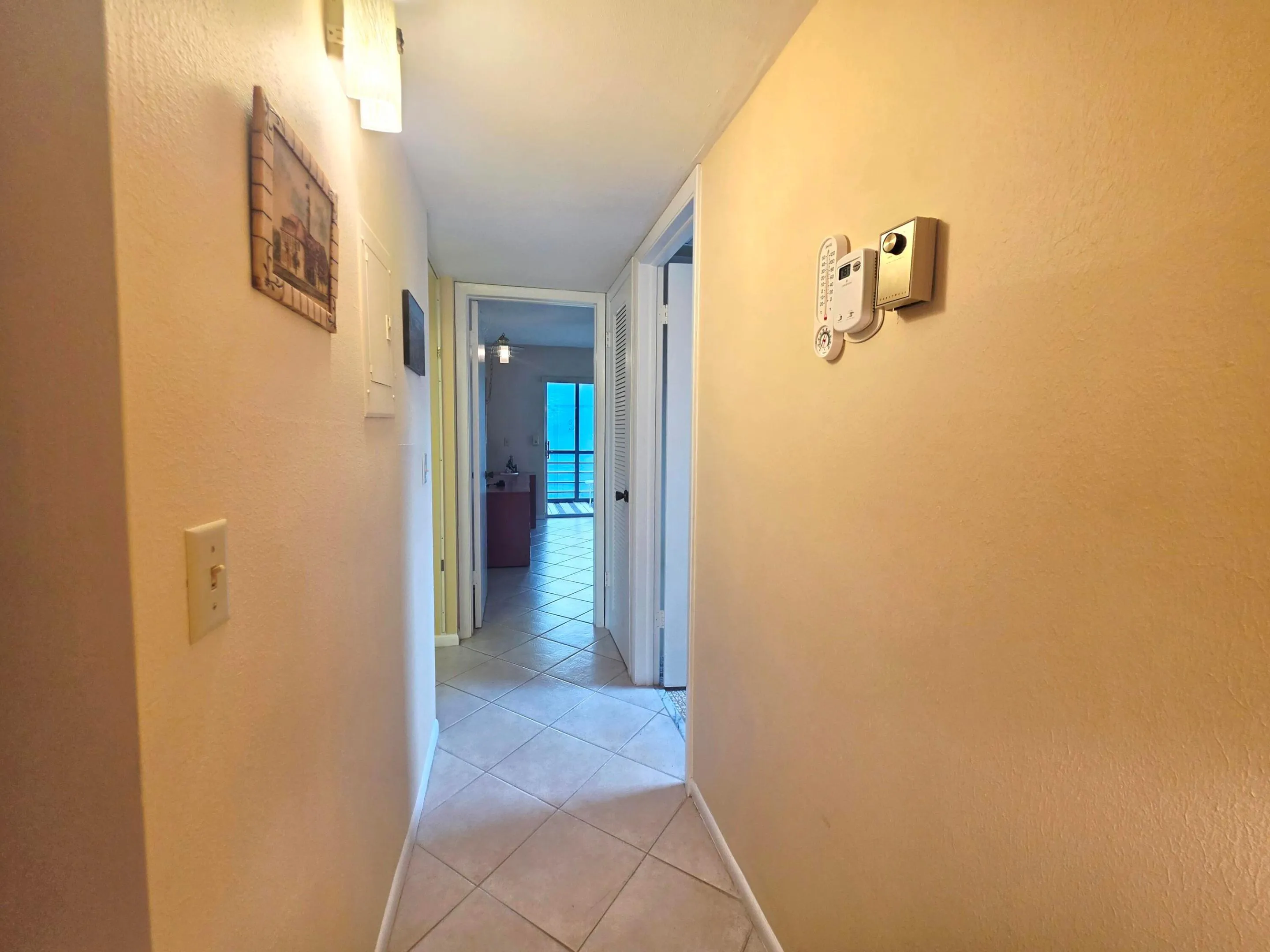 HALLWAY LEADING TO BOTH BEDROOMS & BATHROOMS