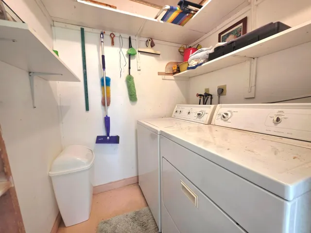 IN-UNIT LAUNDRY/STORAGE ROOM WITH FULL SIZE WASHER & DRYER