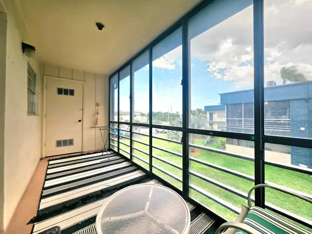 ANOTHER VIEW OF THE BALCONY SHOWING YOUR LAUNDRY/STORAGE ROOM