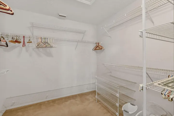 Primary Bedroom Walk in closet