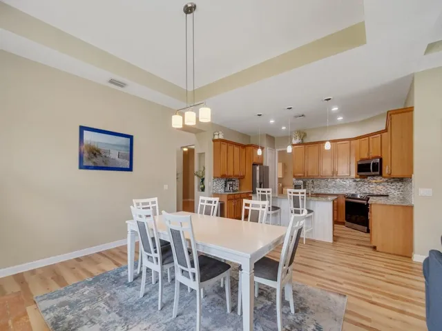 Dinning Room with conferred ceiling