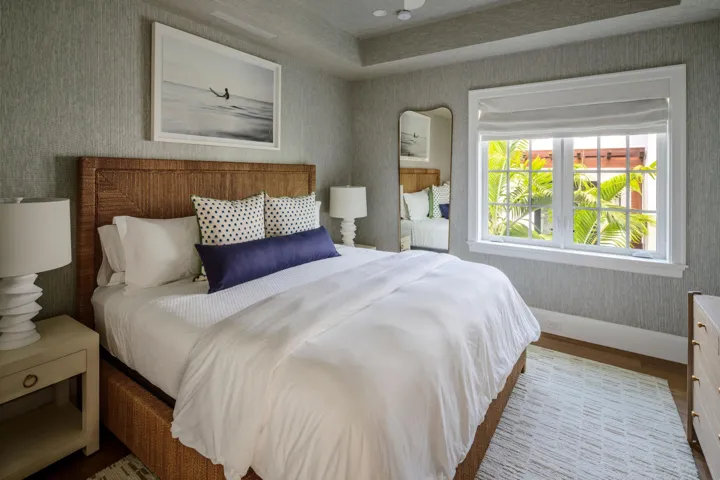 27 - Bedroom with rattan headboard, whit