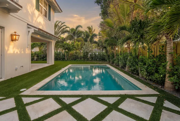04 - White home exterior with covered pa