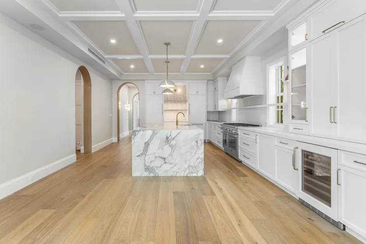 16 - Kitchen island with white marble co
