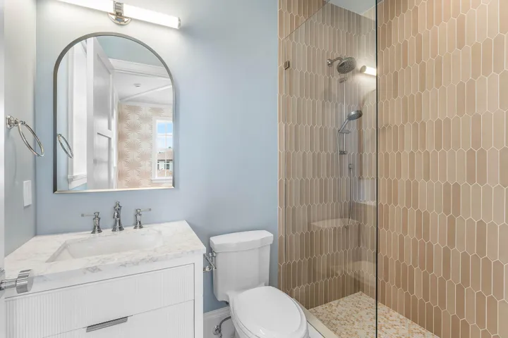 23 - Bathroom with blue-gray walls, gold