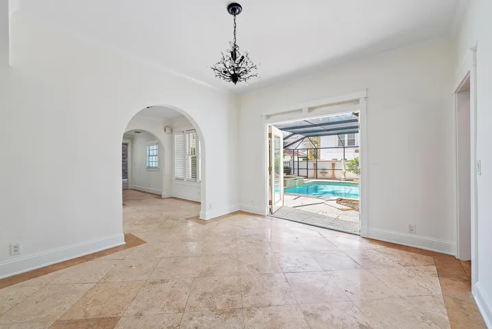 Formal dining area off of pool.