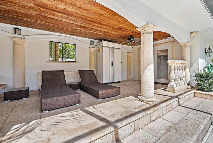 Covered poolside loggia.