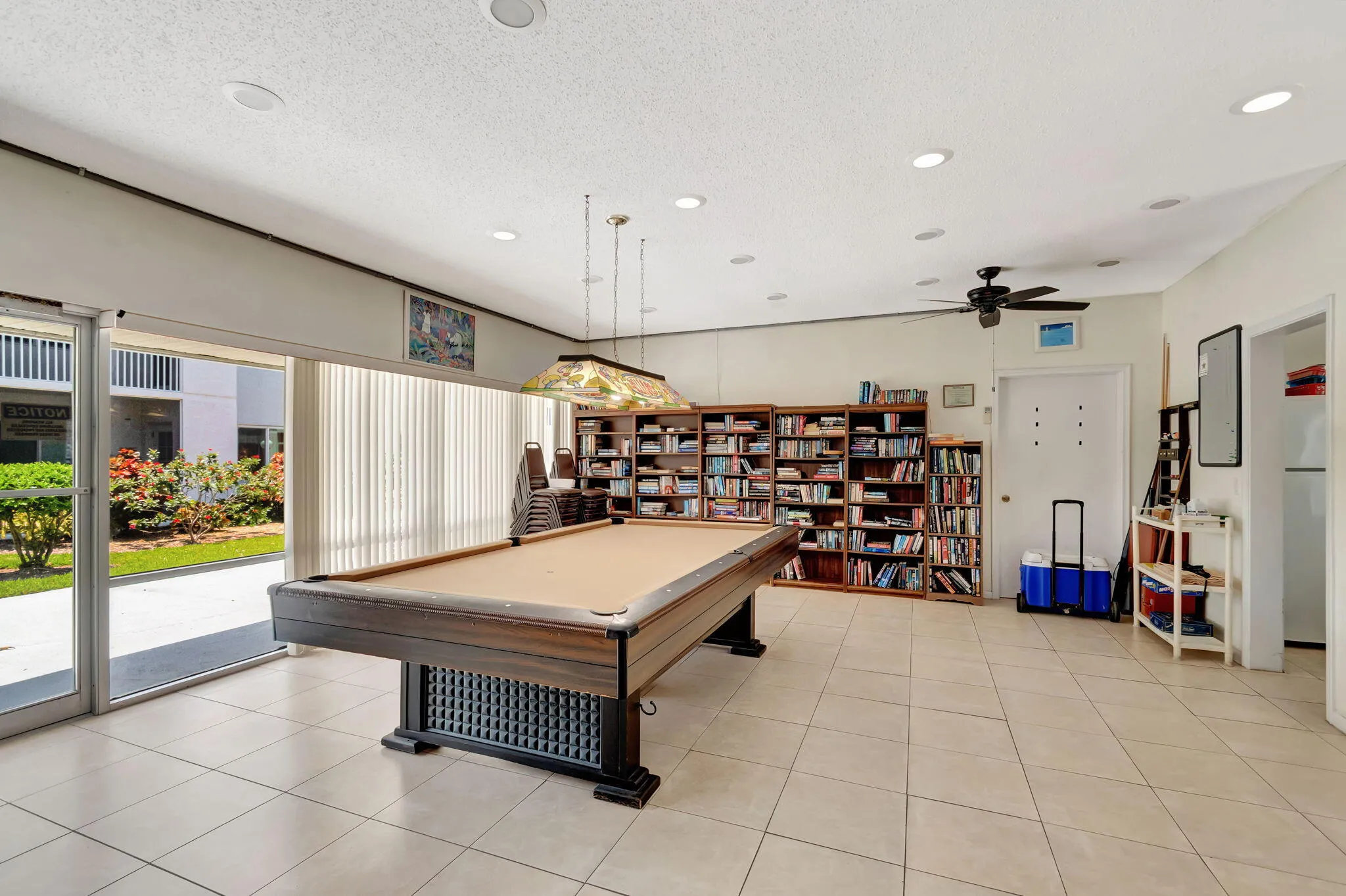 Community Room with Billiard Table and library