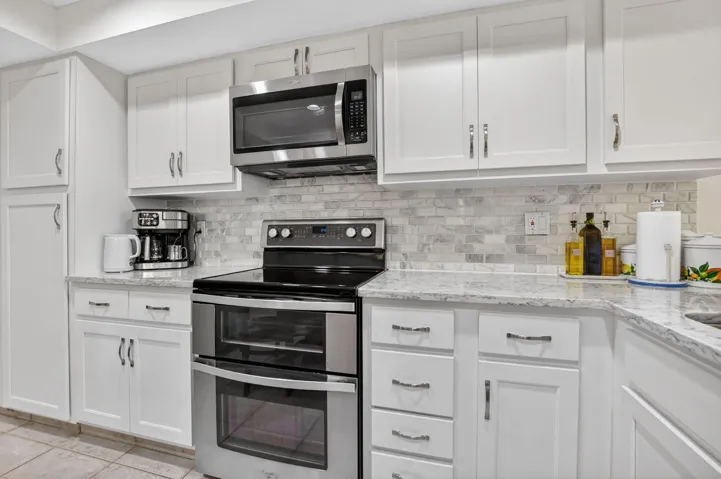 Remodeled kitchen, stainless & quartz