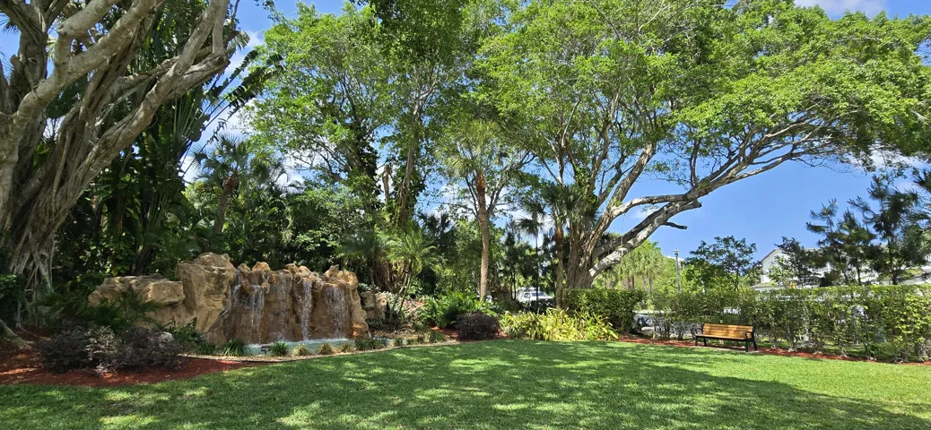 Waterfall entrance w bench