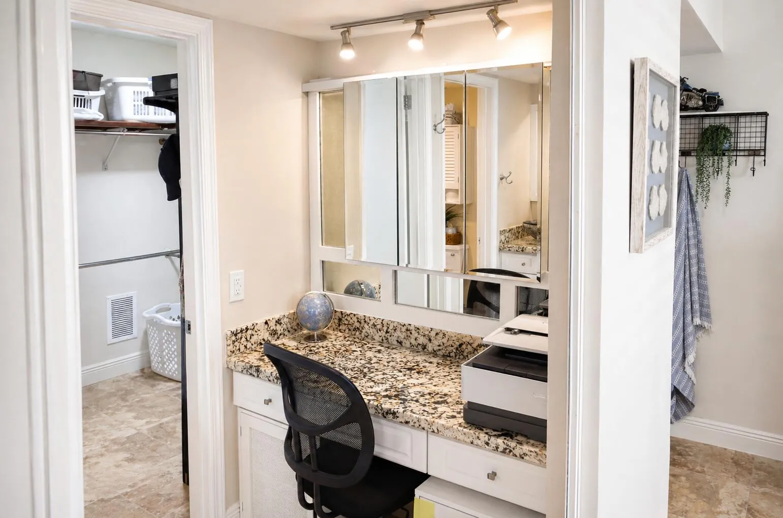 Vanity & Dressing Area – Counter space with built-in storage and lighting.