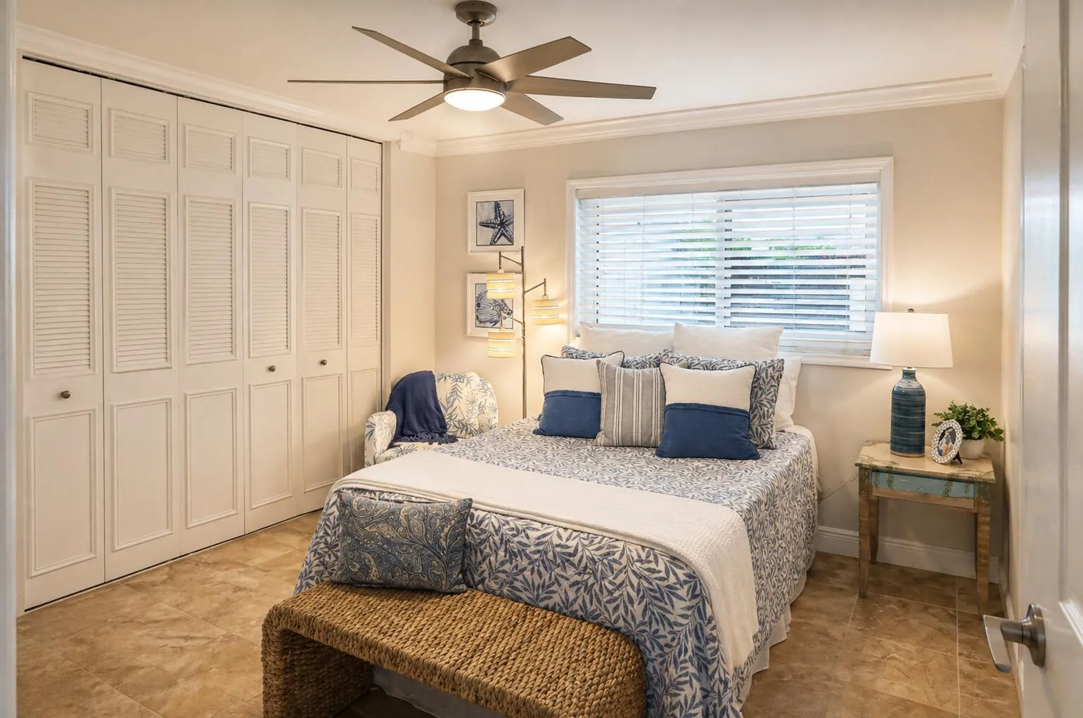 Guest Bedroom – Bright and inviting with ample closet space and coastal tones.