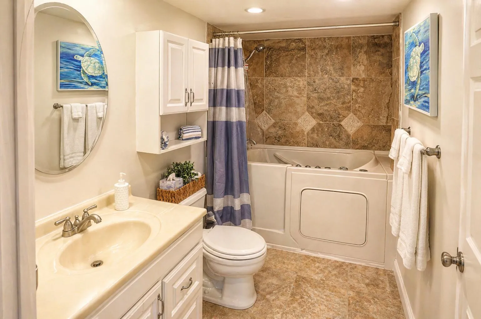 Guest Bathroom – Classic design with walk-in tub/shower combo and updated vanity.