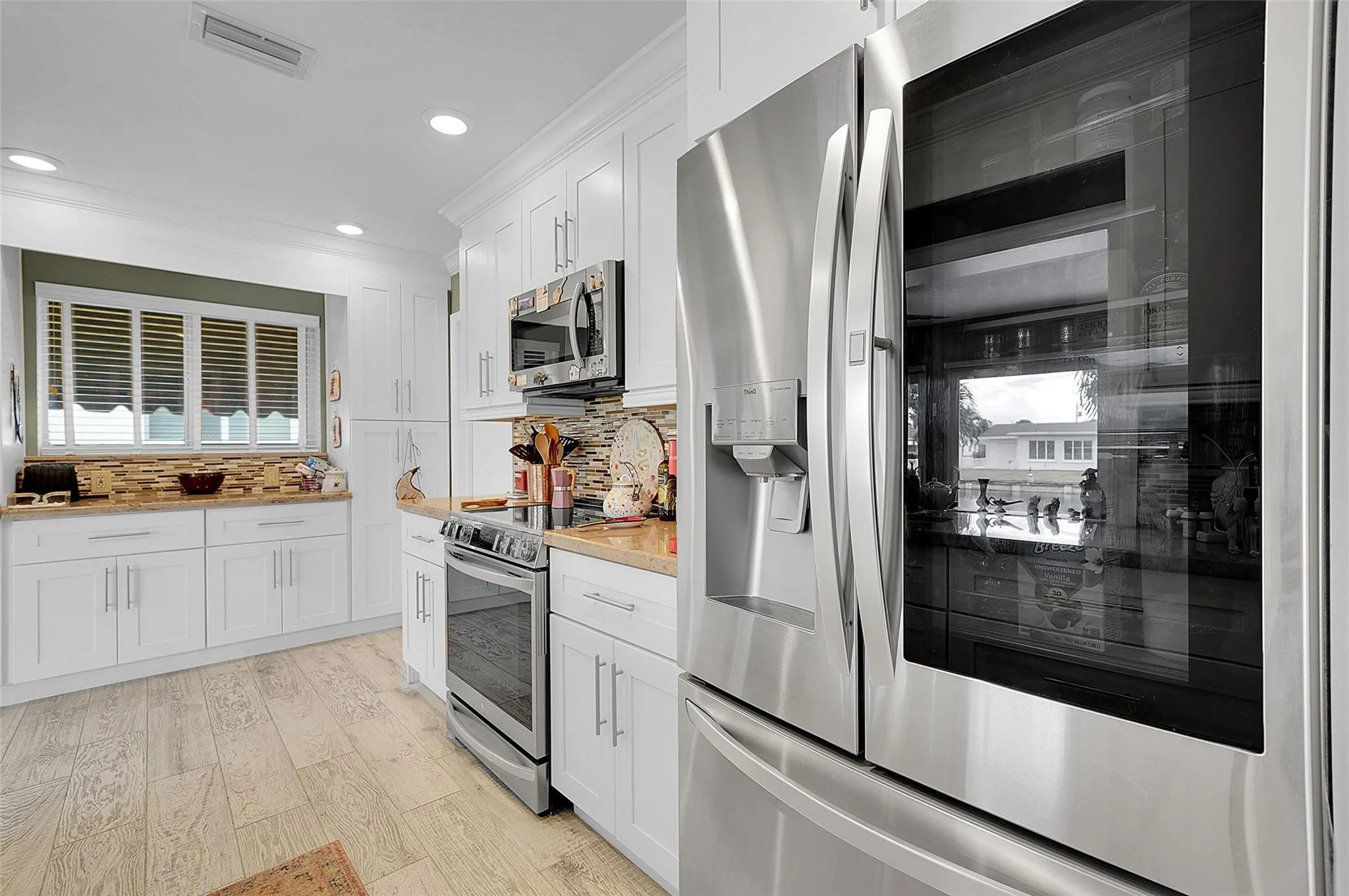 Smart refrigerator with 2 ice makers.