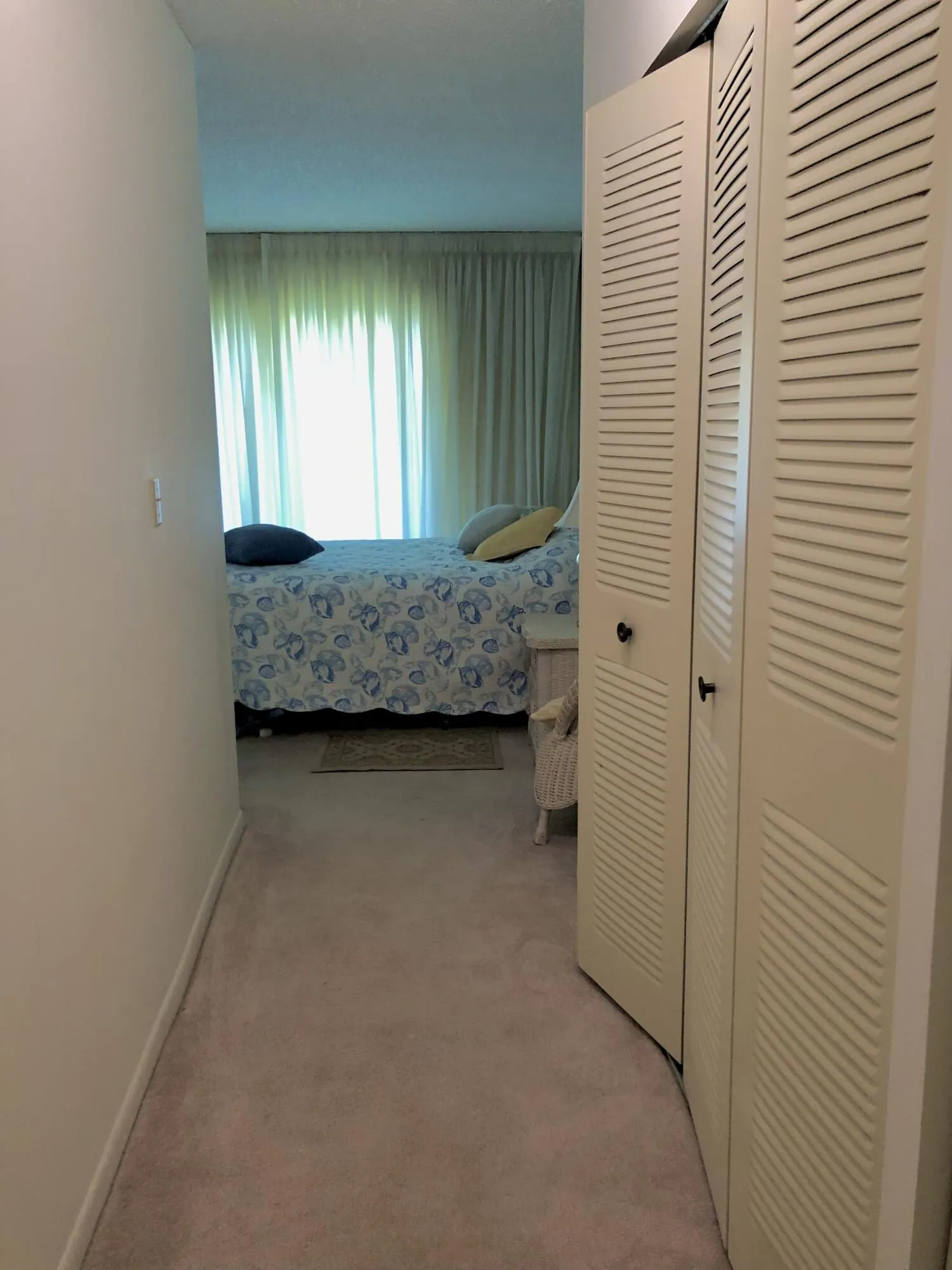 Closet Area Leads Into Master Bath