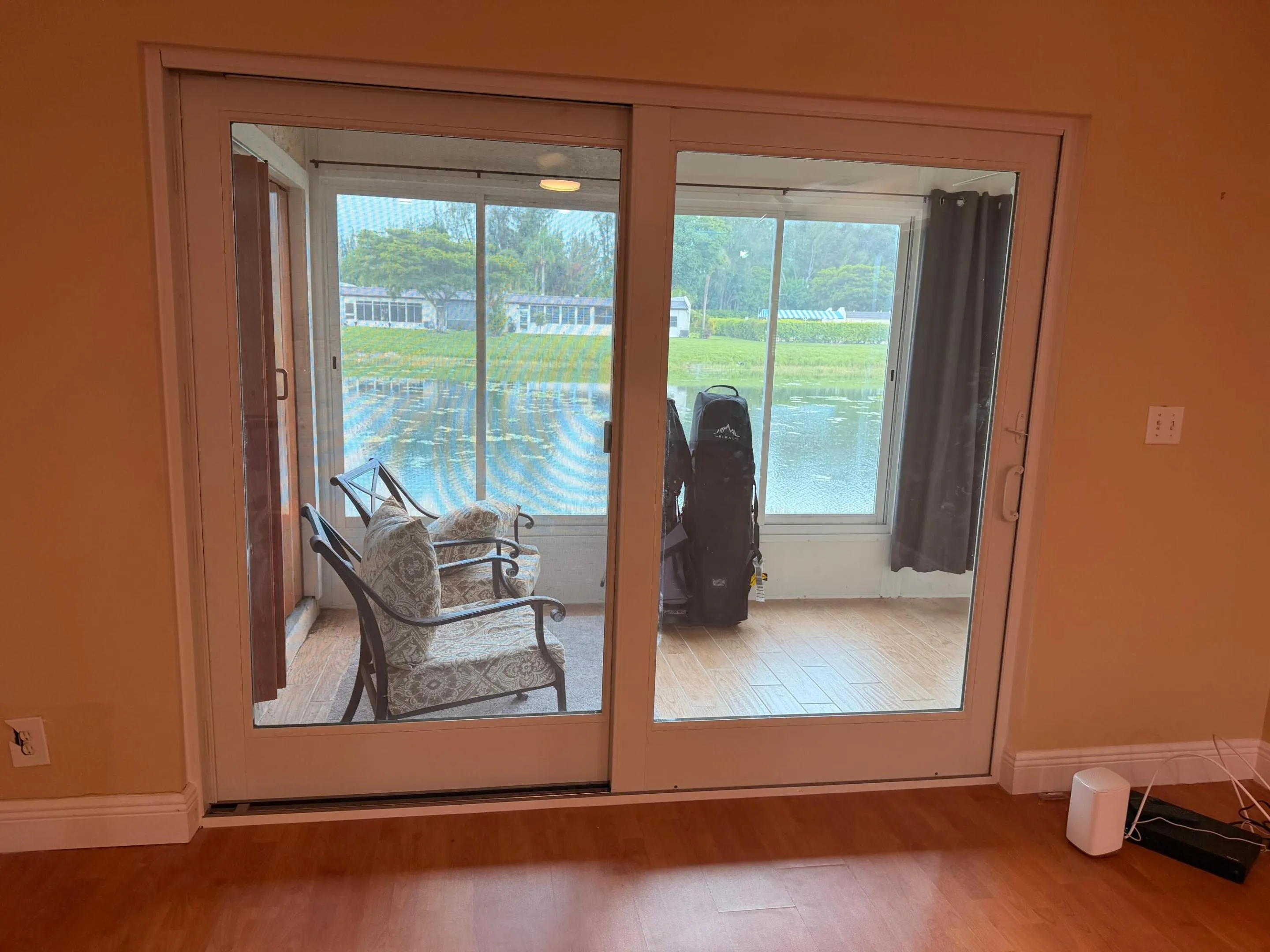 Living Room exit to Enclosed Patio
