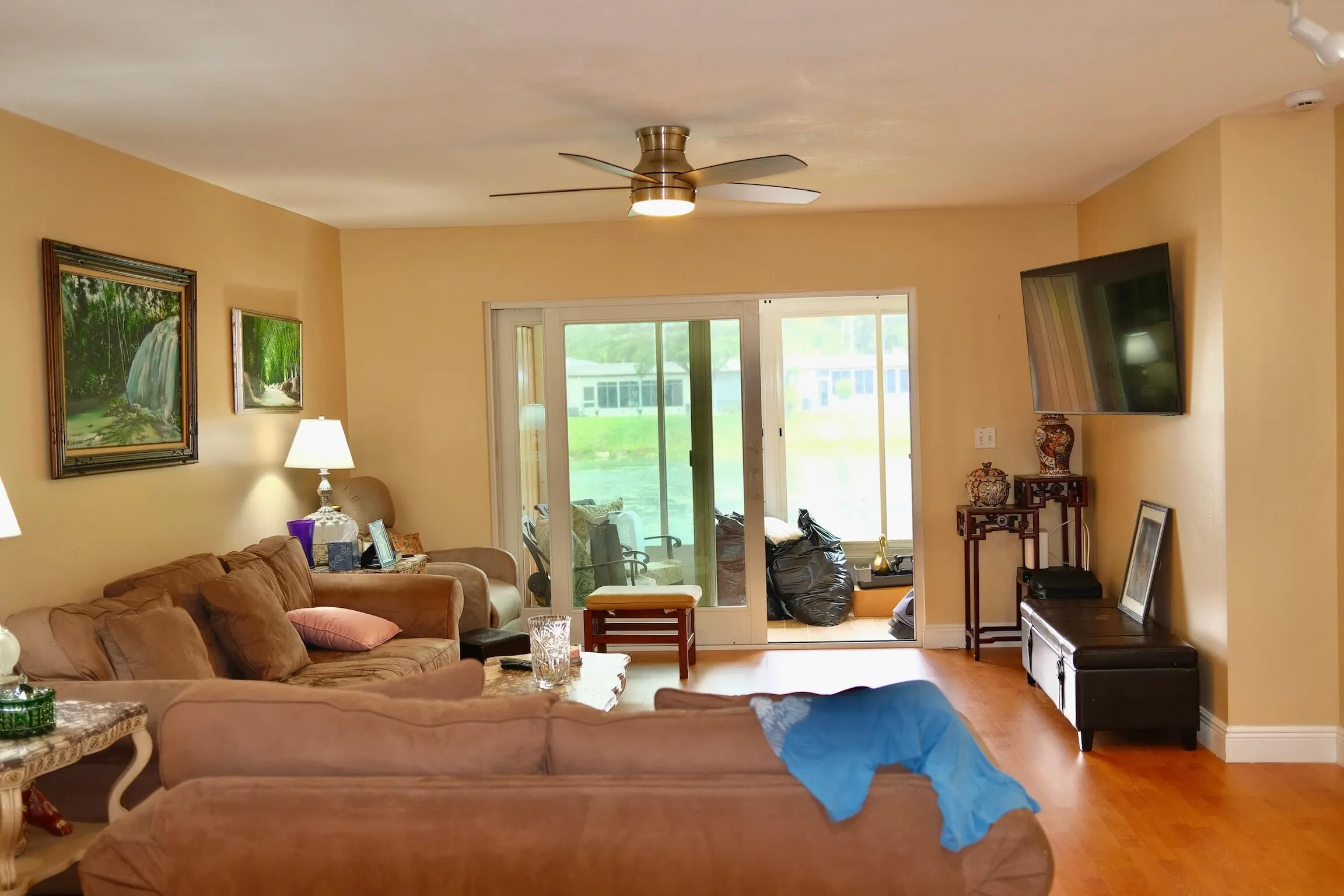 Living Room exit to Enclosed Patio