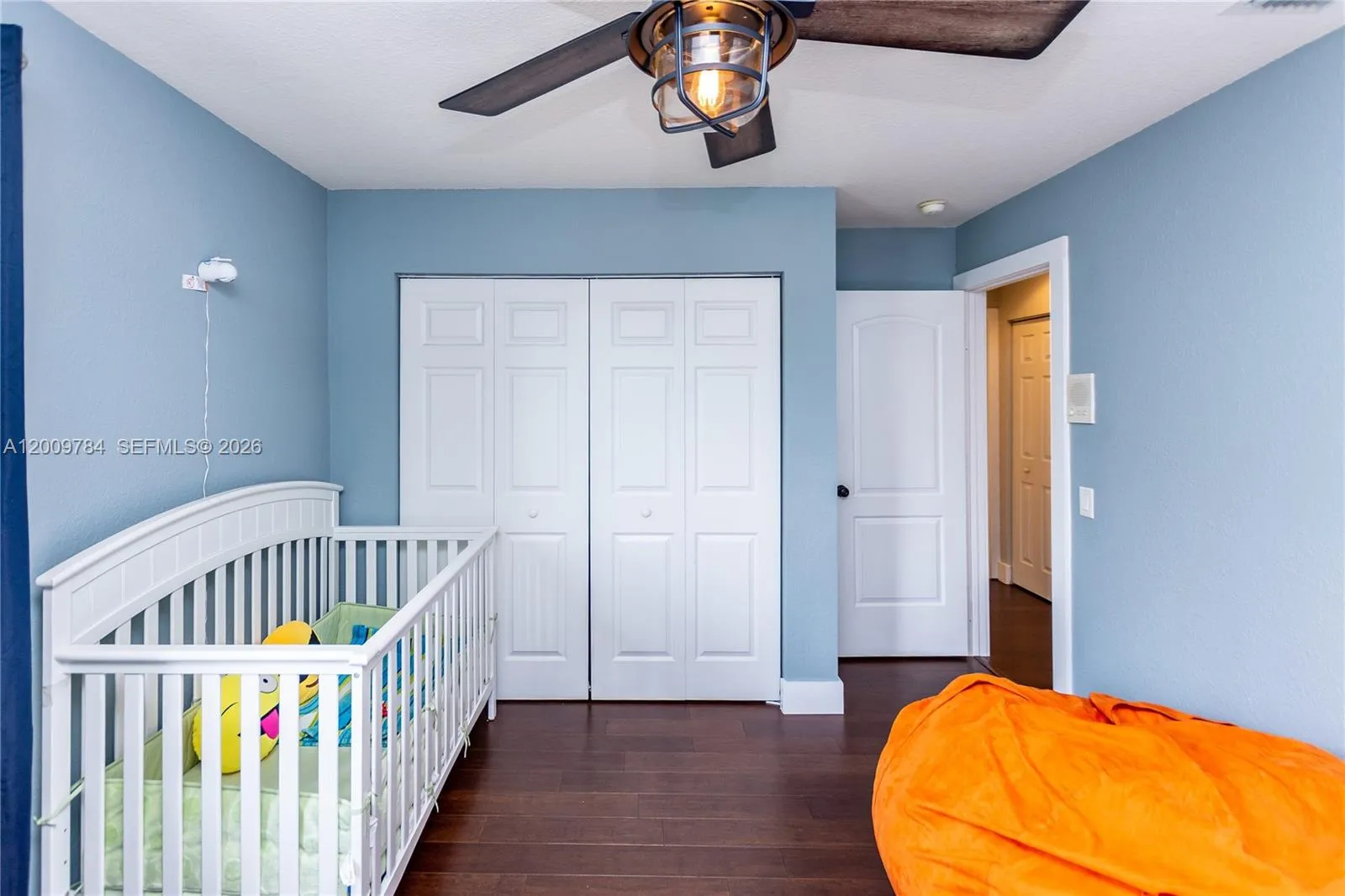 Beautiful 2nd floor corner bedroom with real wood dark floors and lake view