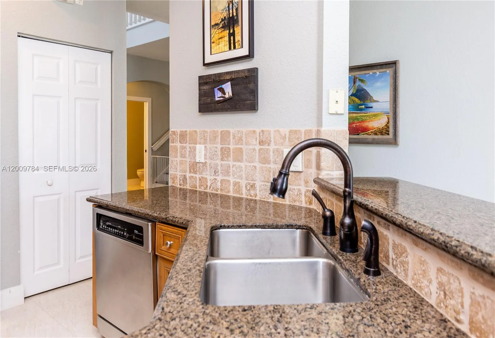 Bright kitchen with also double sink and pantry