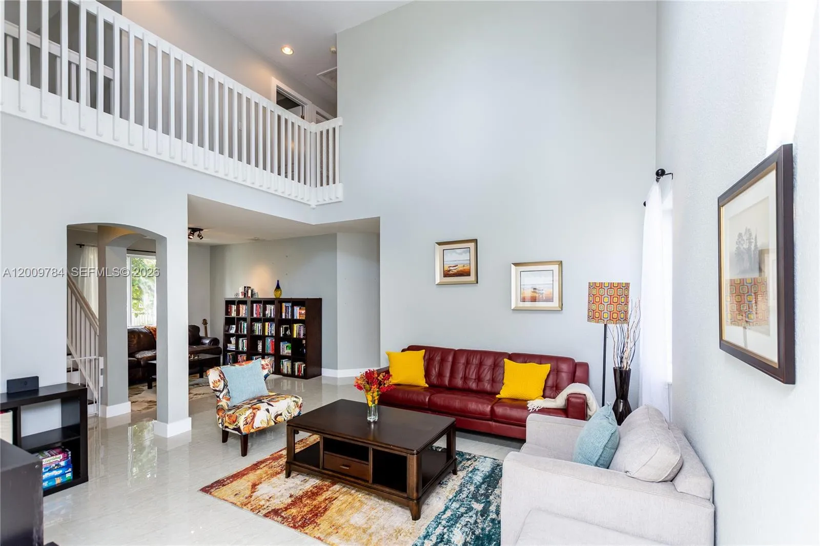 Living room with VAULTED ceilings with lots of LIGHTS
