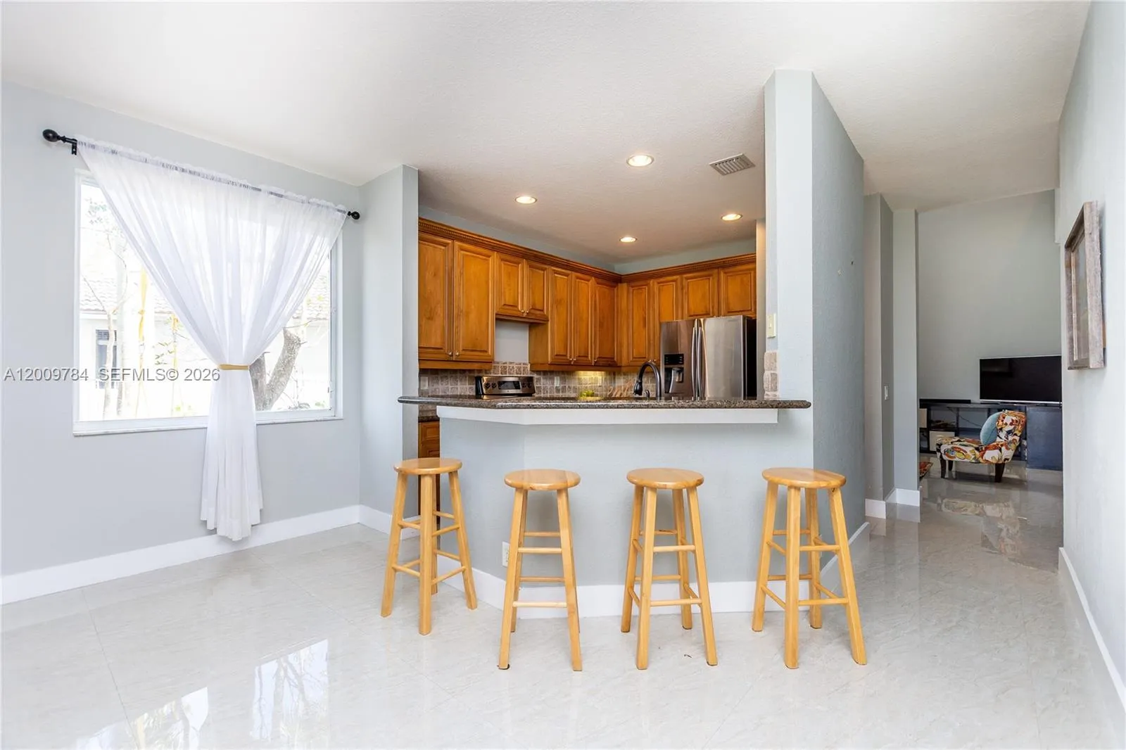 Kitchen with snack/eating bar