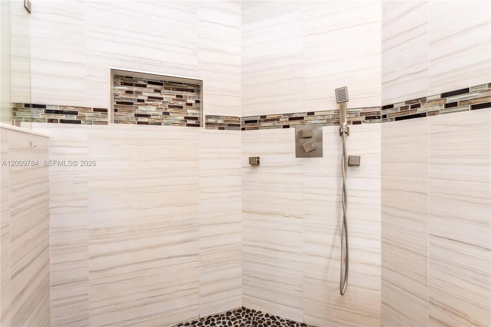 Amazing 1st floor master bathroom with free standing tub, his and hers vanities, rain shower, Italian brass nickel accessories.