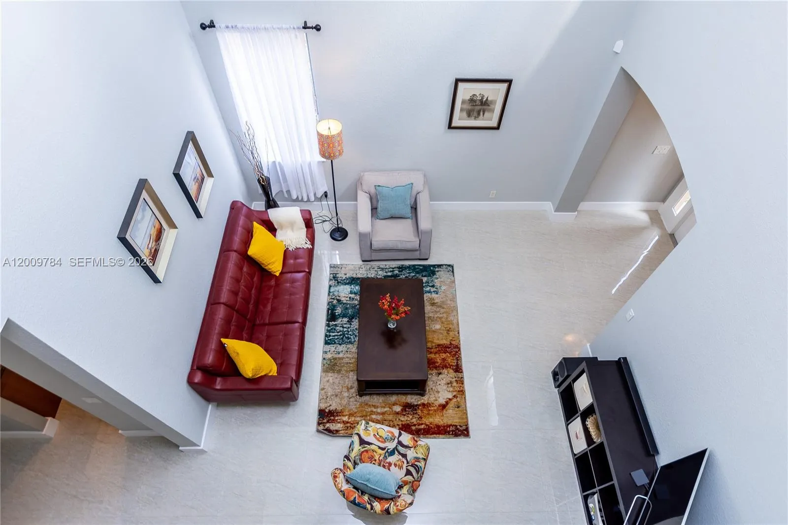 Living room with VAULTED ceilings with lots of LIGHTS