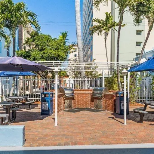 Two barbecues and picnic table area