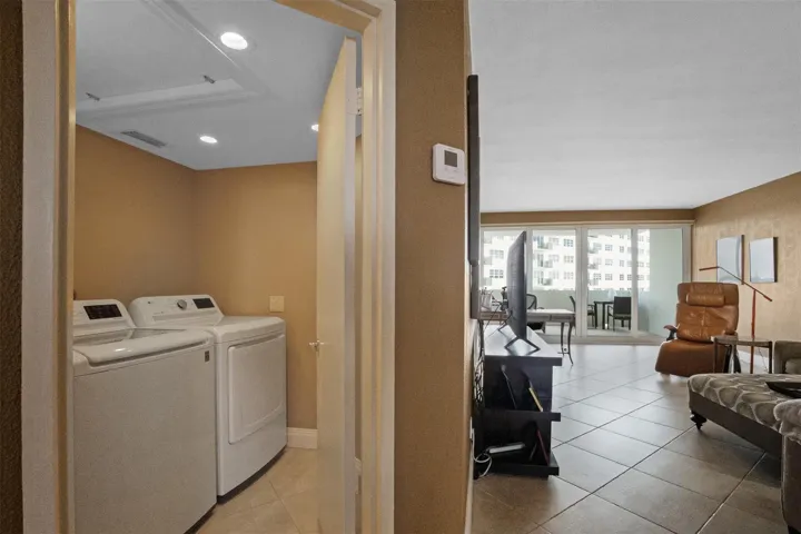 Laundry between Foyer and Living Room