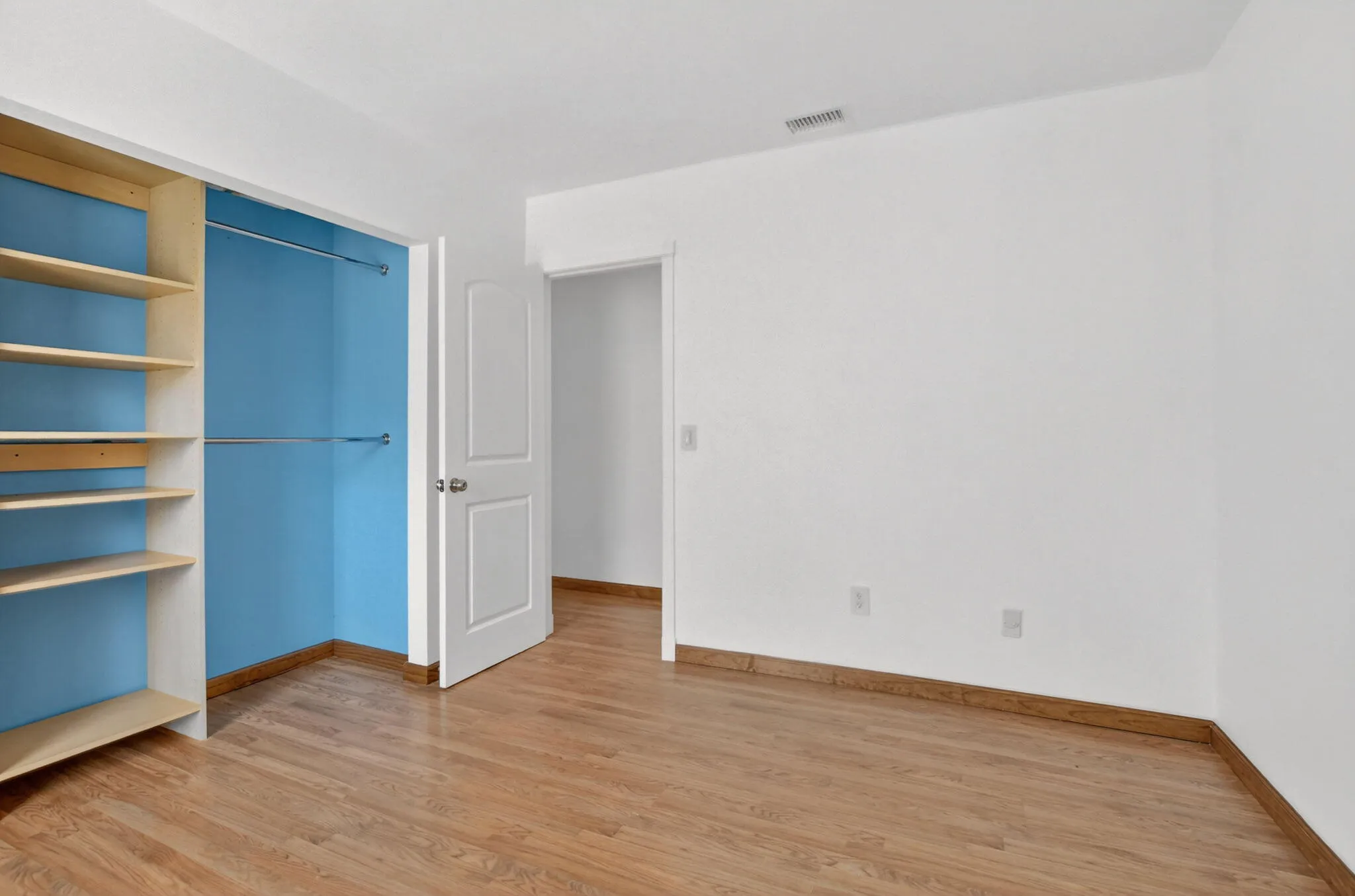 Guest Room 1 with closet shelving