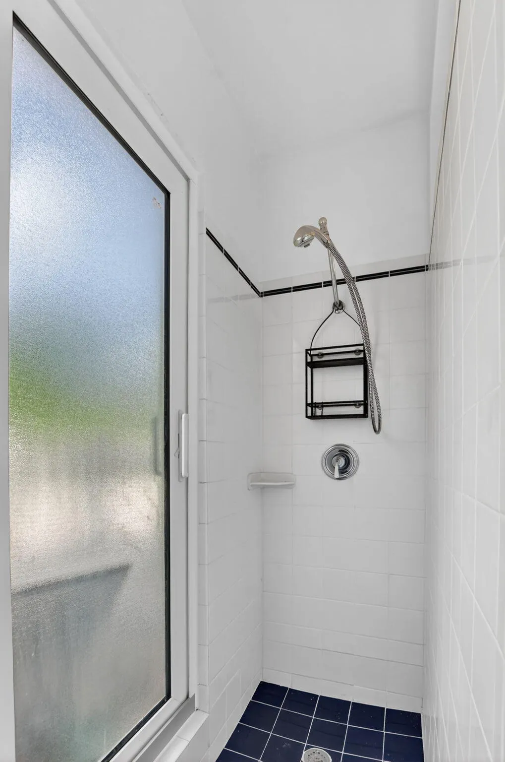 Primary Shower with slider to backyard