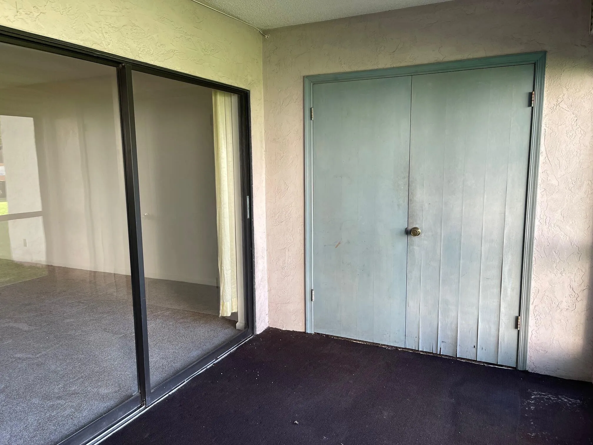 UTILITY CLOSET, AND THIS SLIDER OPENS TO MASTER BEDROOM