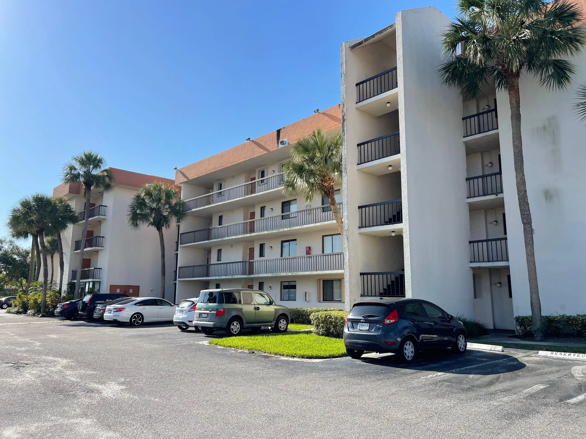 A 4 STORY BUILDING, WHICH YOU ARE ON THE 1ST FLOOR WITH PARKING SPOT IN FRONT OF DOOR.!