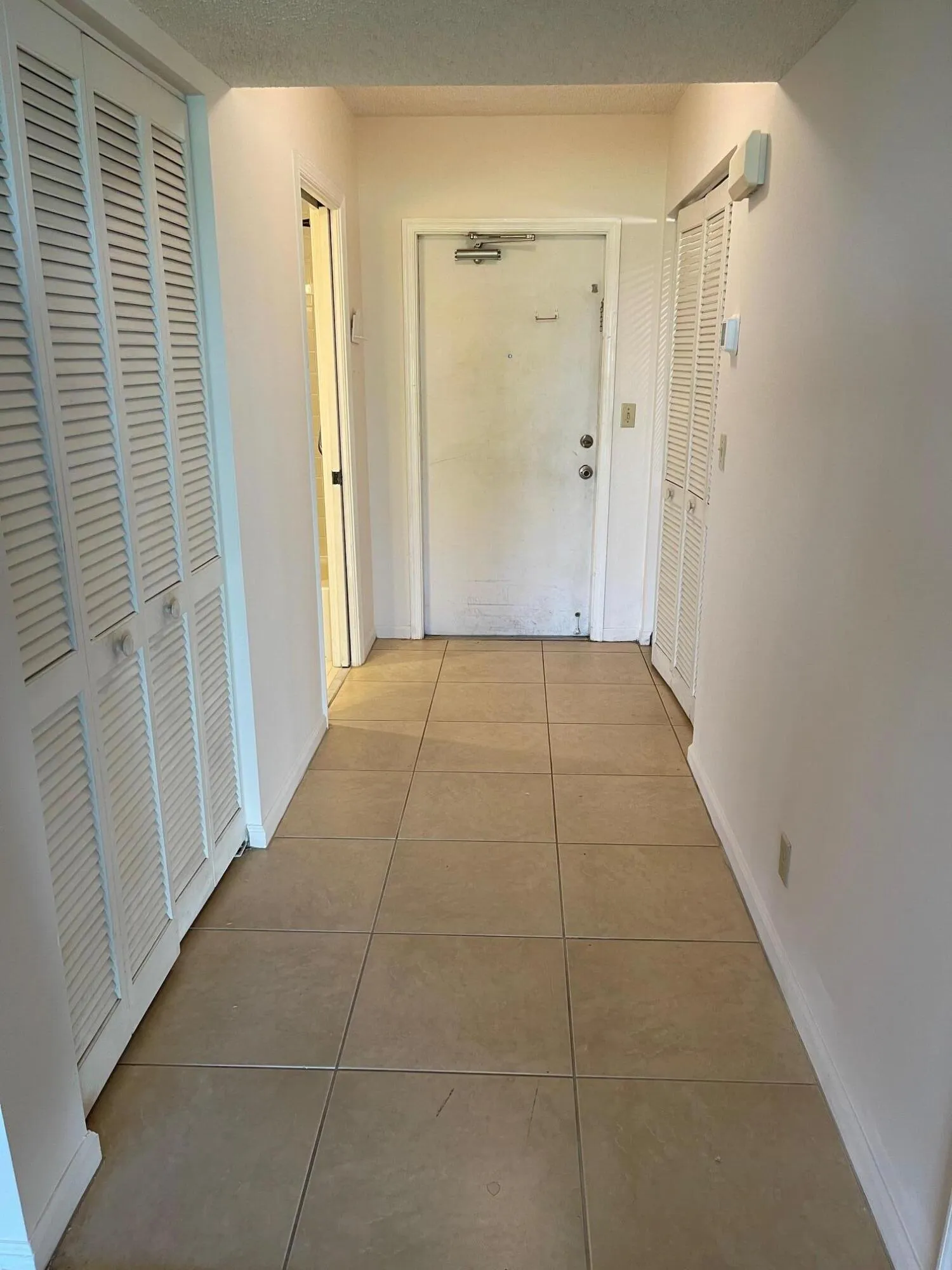 HALLWAY IS 12.6' X 4.7' WITH 2 CLOSETS