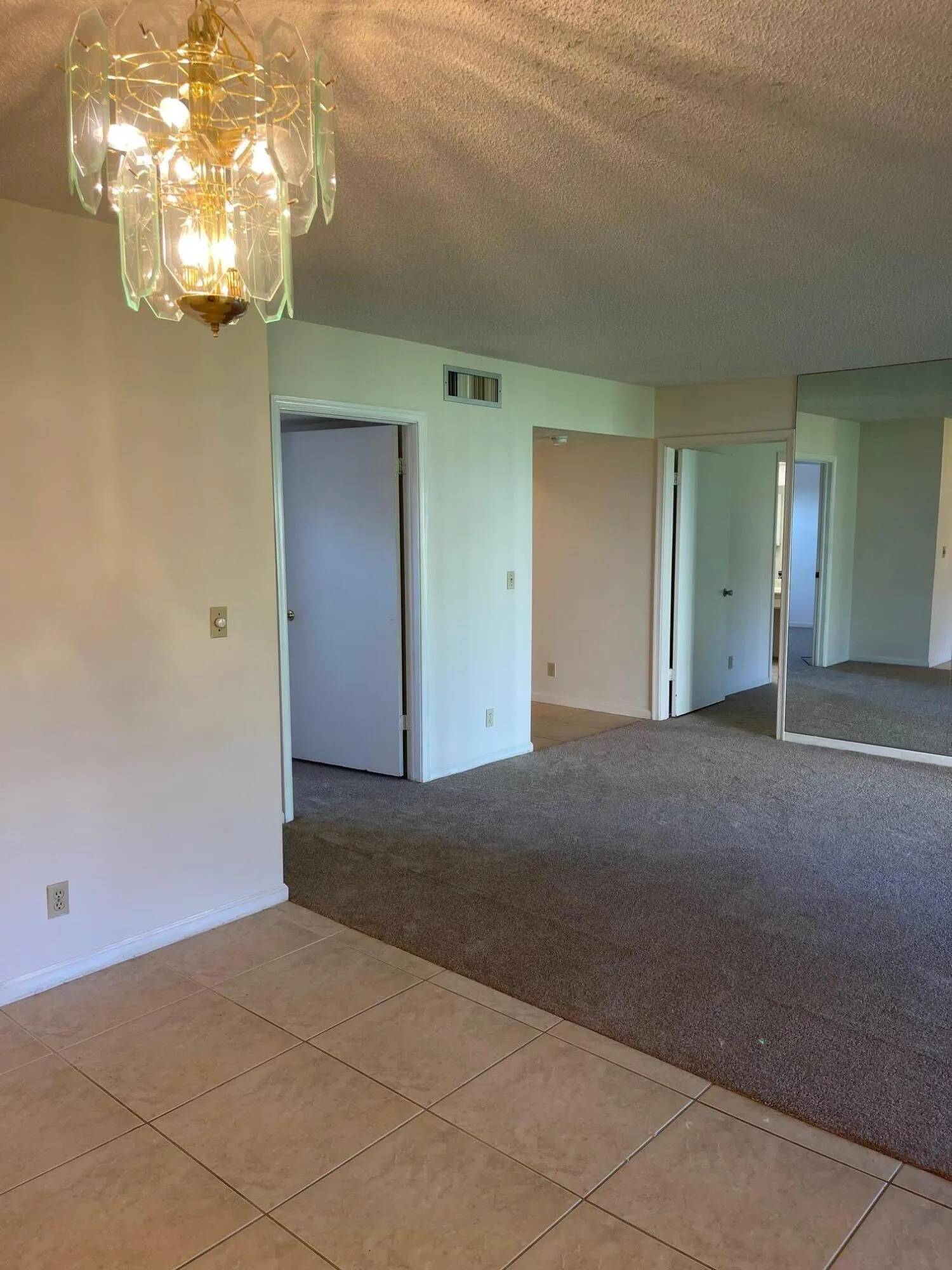 LOOKING FROM DINING AREA TO LIVING ROOM