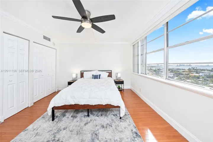 Bedroom with water views & city Views
