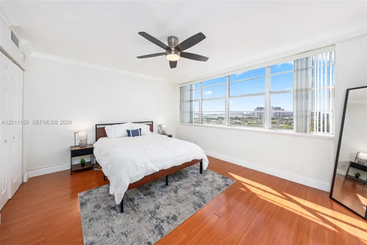 Bedroom with water views & city Views