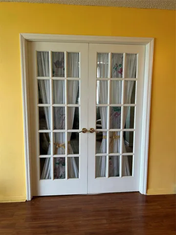 French doors to the bedroom
